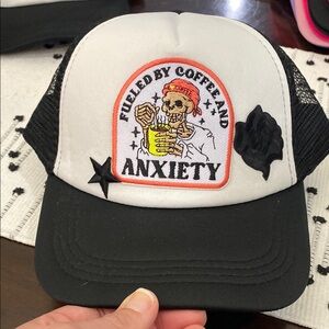 Black and White Trucker Hat with Skull Patch
